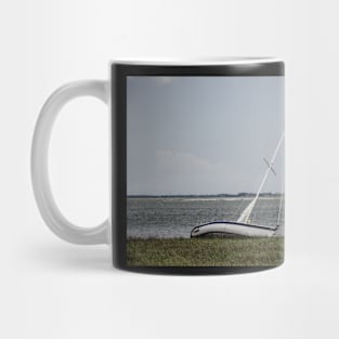 sailboat on the beach Mug